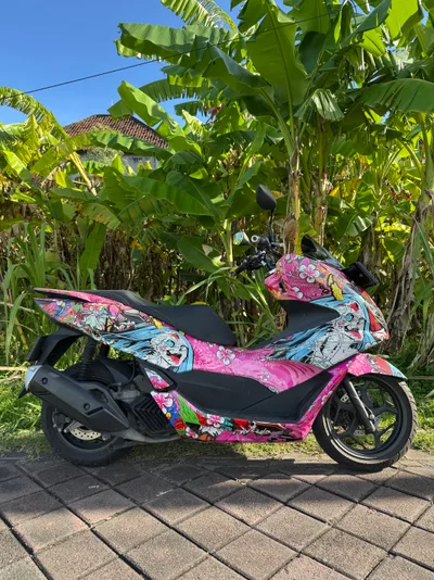 Honda PCX وردي-أزرق (CBS)